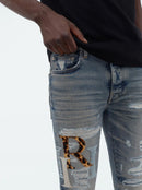 Amiri Leather Staggered Logo Jeans in Blue