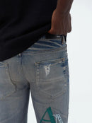 Amiri Leather Staggered Logo Jeans in Blue